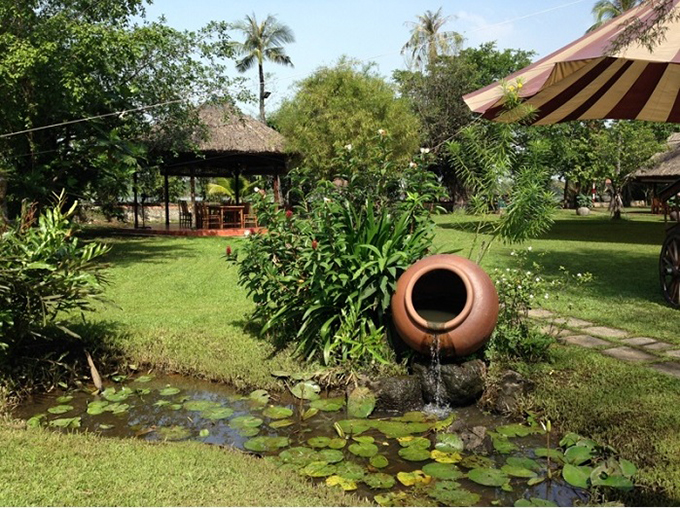 Nhấn để xem ảnh chất lượng hơn Thiết kế sân vườn phong cách Việt Nam